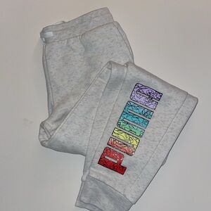 PUMA light gray sweat pants, kids size large 14-16 never worn, side pockets